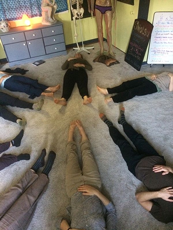 Group of so many people lying on the floor