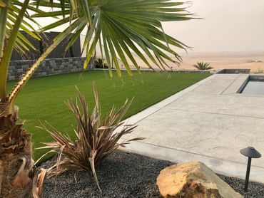 artificial turf, concrete, backyard landscaping