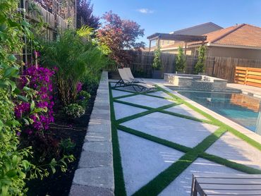backyard turf diamond pattern, pool and landscaping