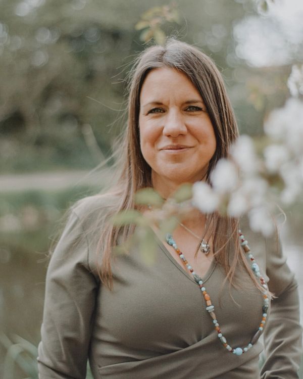 Rebecca Garratt near therapy room overlooking the countryside canal in Newport Shropshire.