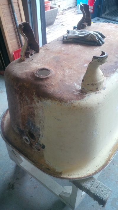 Old rusty claw foot tub