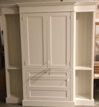 White wooden cabinet with shelves.
