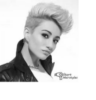 Woman with grey hair wearing a black jacket