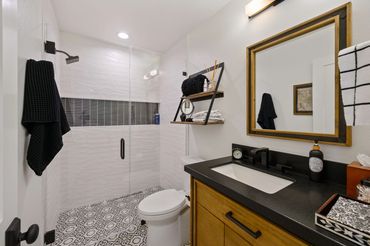 Bathroom remodel custom cabinets tile slab Irvine