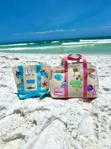 Custom made two colorful beach bags perfect for lazy beach days.