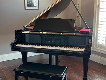 A Yamaha baby grand piano