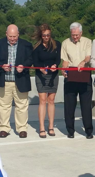 Ribbon cutting for a reconstructed bridge approved by bonds and