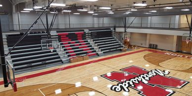 Basketball goal maintenance, safety strap inspection, divider curtain maintenance