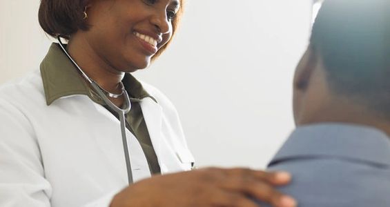 Doctor smiling at patient