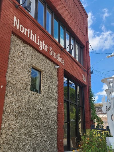 Exterior photo of NorthLight Studios on Depot Street in Asheville, North Carolina, during business h