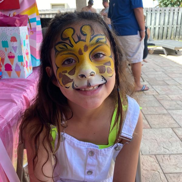 Giraffe face, paint, jungle animal face paint ideas for safari parties