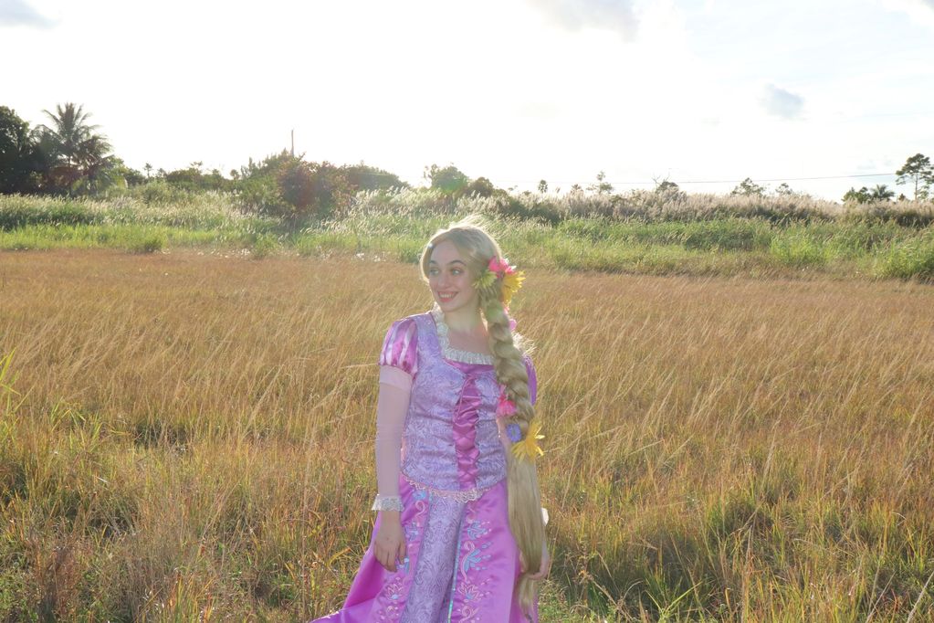 Rapunzel in a field of long grass 