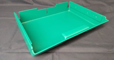 Thermoformed thick gauge plastic drawer painted green