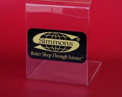 Plastic Fabrication. Bent acrylic mattress tag holder with highly specific silk screen.