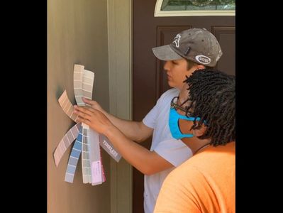 Dalton Vass, Founder of Vassett Painting giving a color consultation to a Florida client.