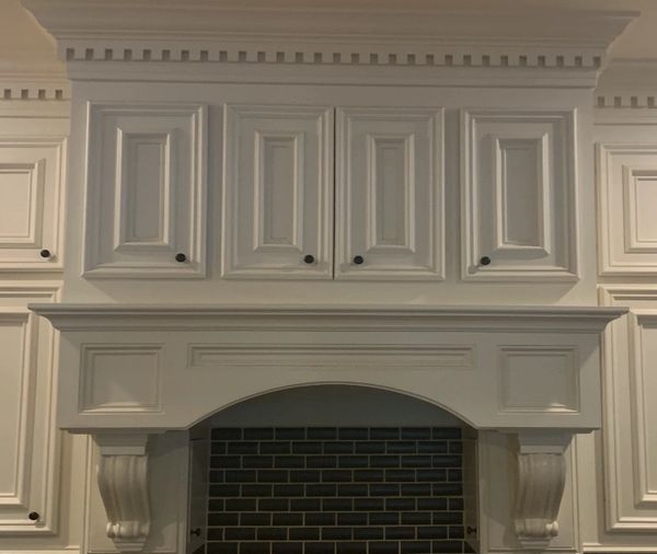 Intricate Detail Cabinetry Refinished in Cape Coral by Vassett Painting.