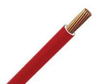 Red insulated electrical wire with exposed copper strands.