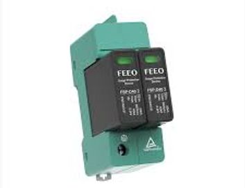 Compact green and black electrical surge protector device.