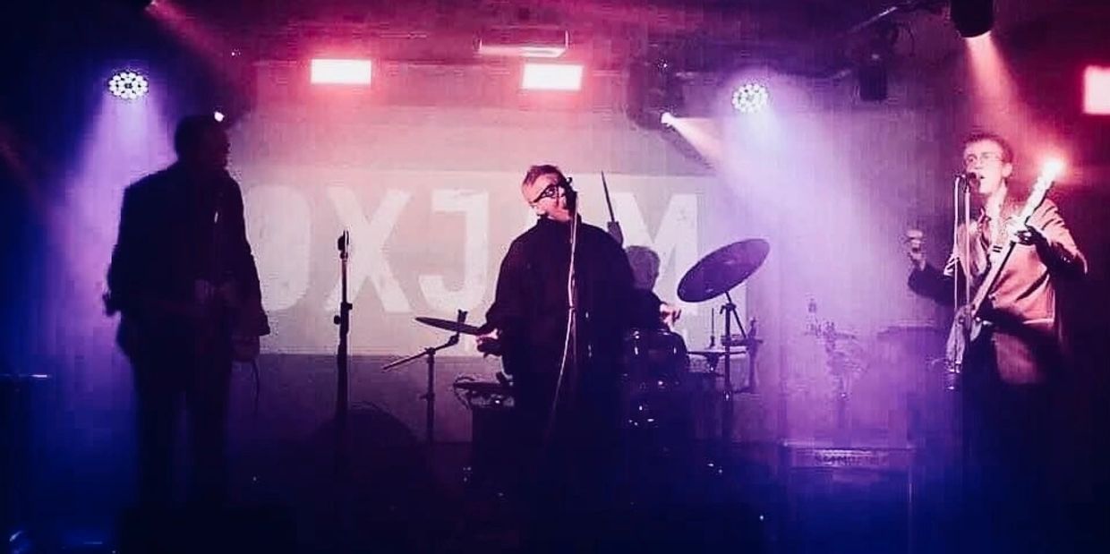 Peter (left) with Julie Grant and full band