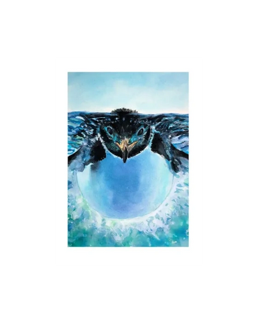 A penguin looks out the glass of his enclosure at the zoo