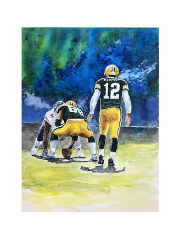 Quarterback, Aaron Rodgers calling the play on a cold day