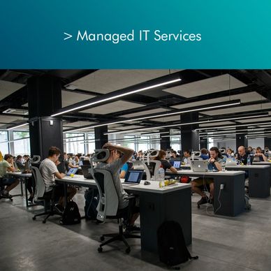 Large office workspace with employees working on their laptops. Showcasing the importance of efficie