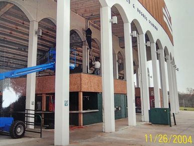 installing bird netting takes aerial lifts to access the heights of awnings