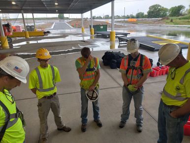 guys praying before the job starts to get ready for the day
