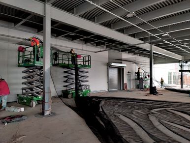 process of installing netting takes coordination and teamwork to install correctly