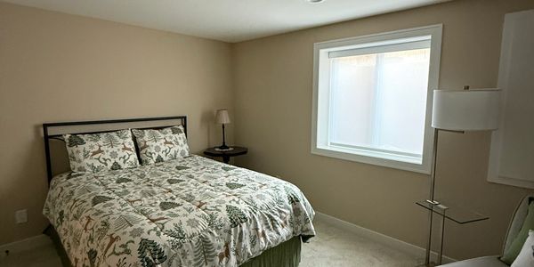 Bedroom with light filtering shade