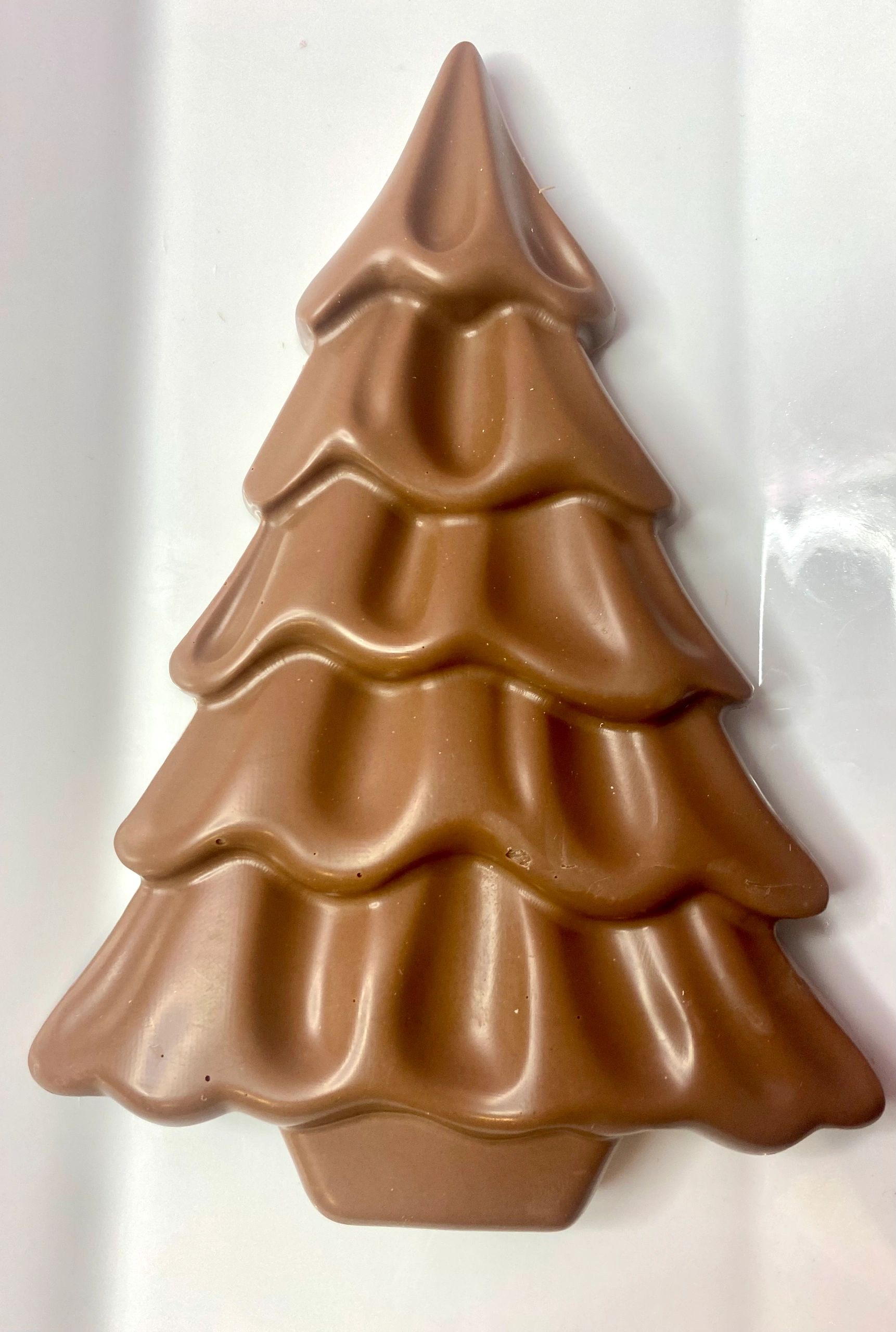 Chocolate shaped like a Christmas tree.