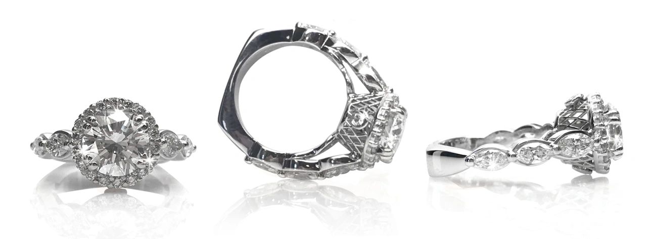 custom made white gold ring with round diamonds and marquise accents