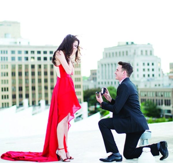 Gorgeous couple's rooftop proposal