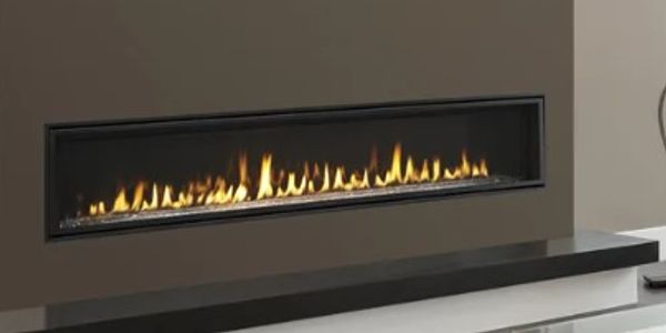 Gas linear fireplace in neutral surround
