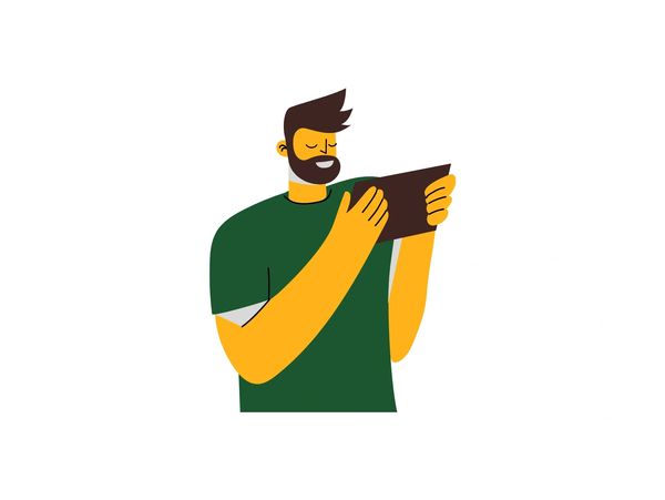 Man reading a book on his tablet