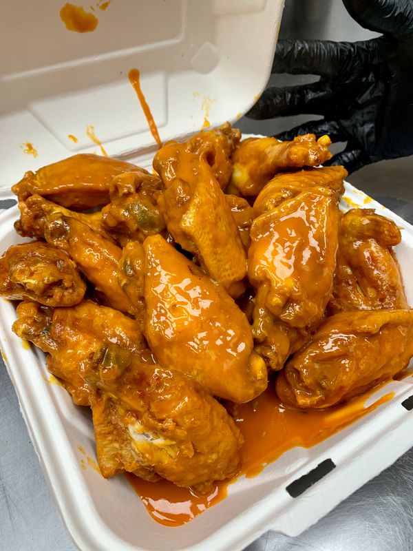 Golden Flame sauce bone-in wings at Golden Flame Hot Wings