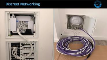 Network cables neatly routed in concealed wall panels.