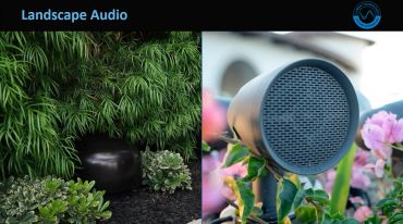Outdoor landscape audio speaker system blending with plants.