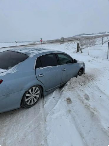 Stuck in the snow. Was able to pull the customer out and get them back on the road quickly!