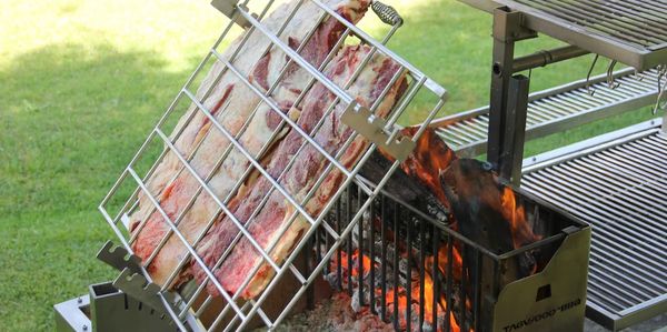 Whole animal cooking on rotisserie