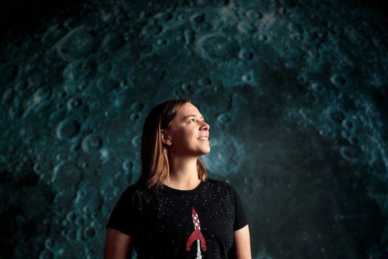 Professor Lisa Harvey-Smith, astronomer, author and Women in STEM ambassador looks up at the moon.