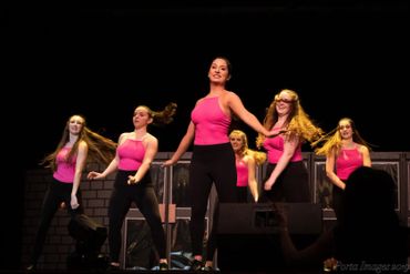 Sing-Out dancers on stage.