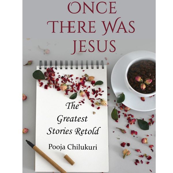 Journal and coffee mug, flower petals, and a pen: book cover for Once There Was Jesus