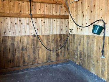 Golden Sunset Farm interior wash stall with heated water