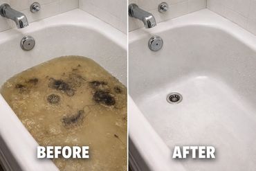 Blocked bath drain cleared and flowing freely again after professional unblocking service in London.