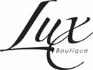 Elegant black and white logo of Lux Boutique with stylish cursive font.