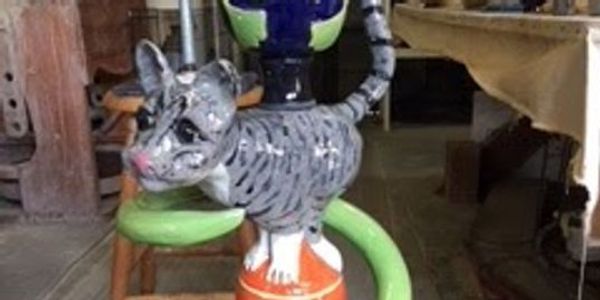 standing cat sculpture