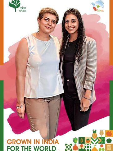Two women posing with APEDA logo promoting Indian agricultural products.