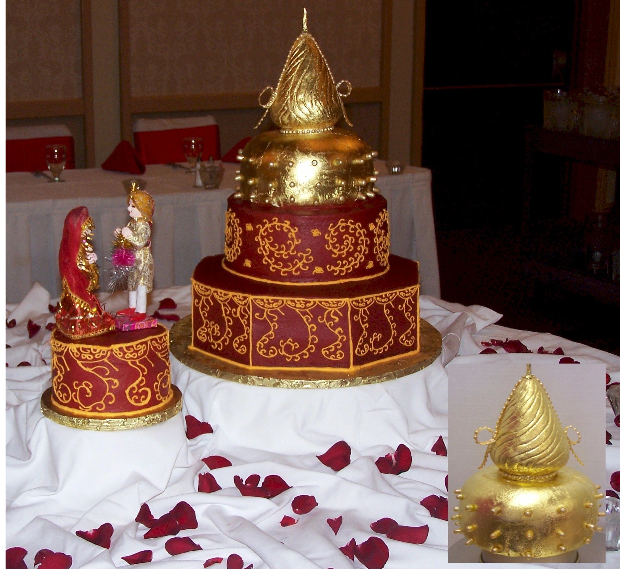 God and Red for an Indian Wedding.  Topper is finished with gold leaf.