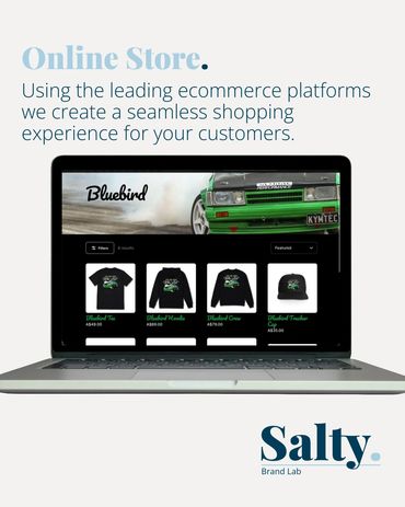 Laptop displaying an online store for Bluebird merchandise with car-themed apparel.